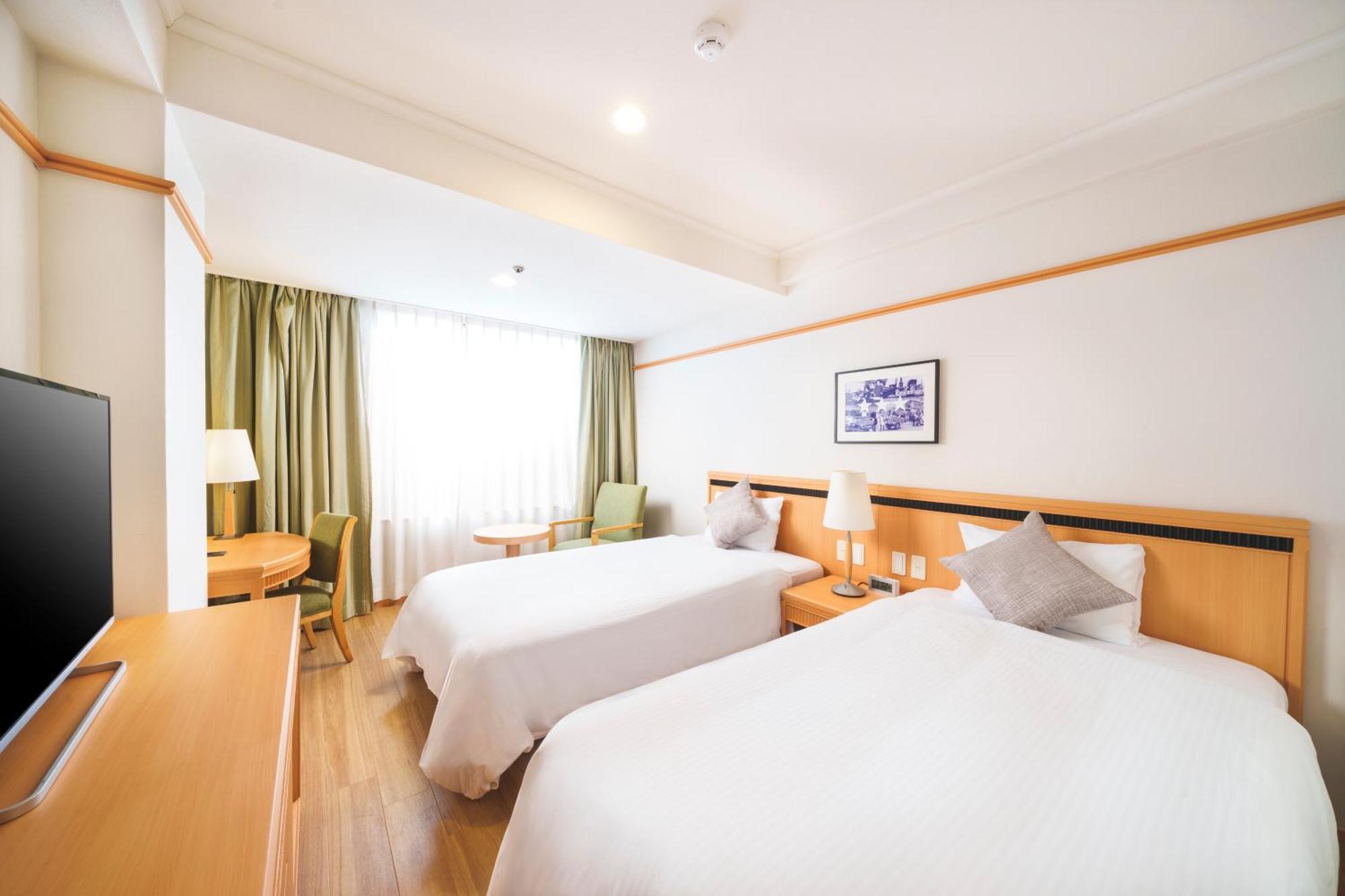 Orion Hotel ناهَ الغرفة الصورة